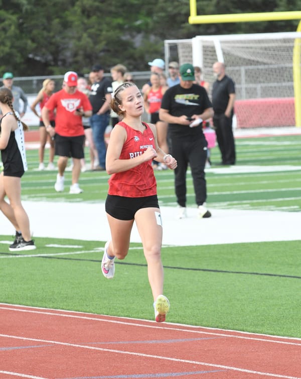 BULLPUPS SHINE AT HOME TRACK INVITATIONAL